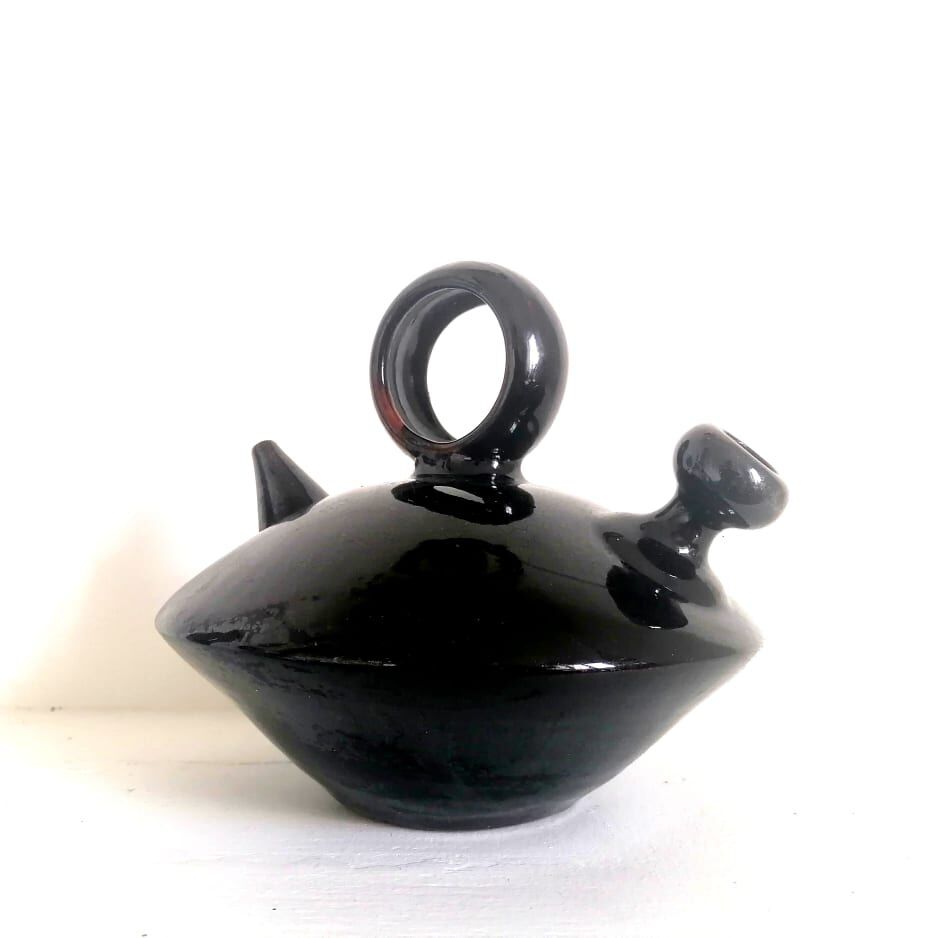 Chevrette modernist in black enamelled sandstone, circa 1970