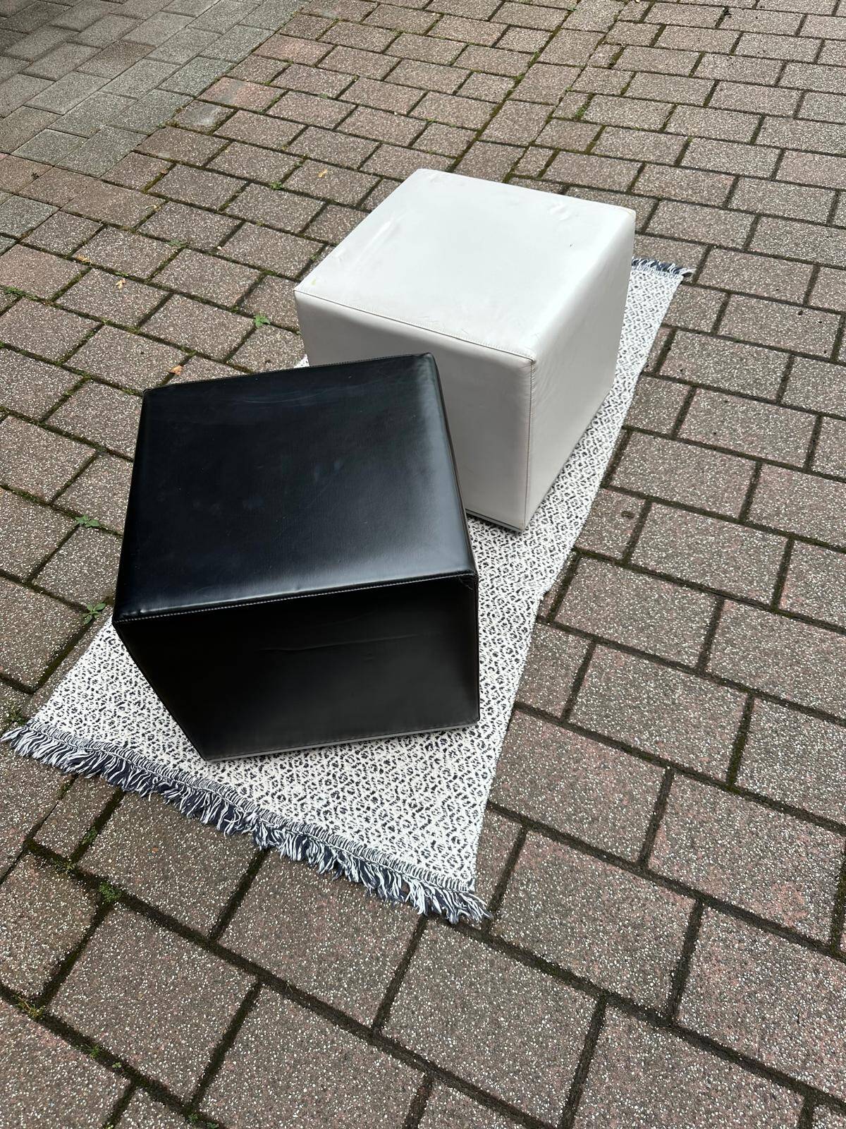 Pair of designer poufs in faux leather