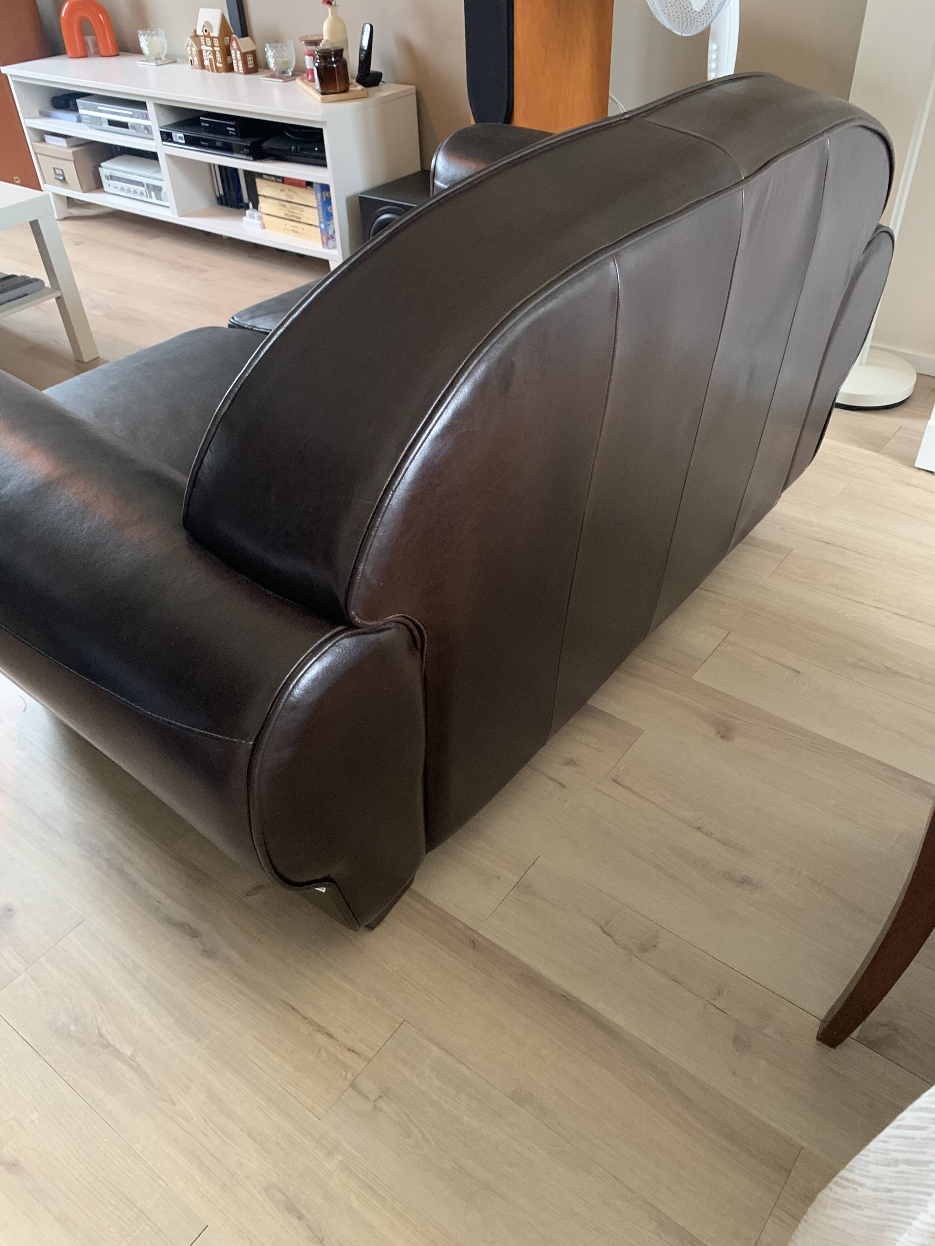 Brown leather club sofa