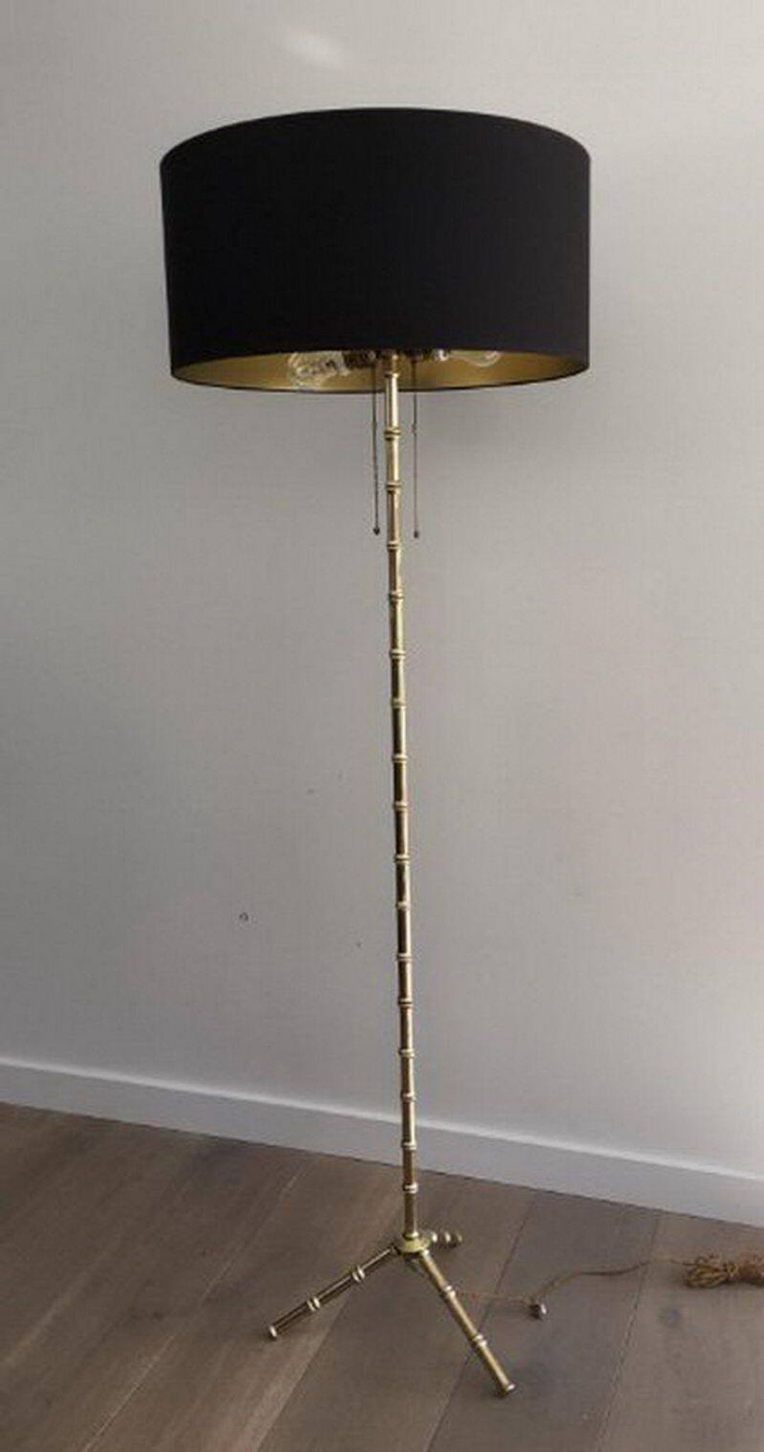 Floor lamp in faux-bamboo style, made of bronze and brass by Jacques Adnet
