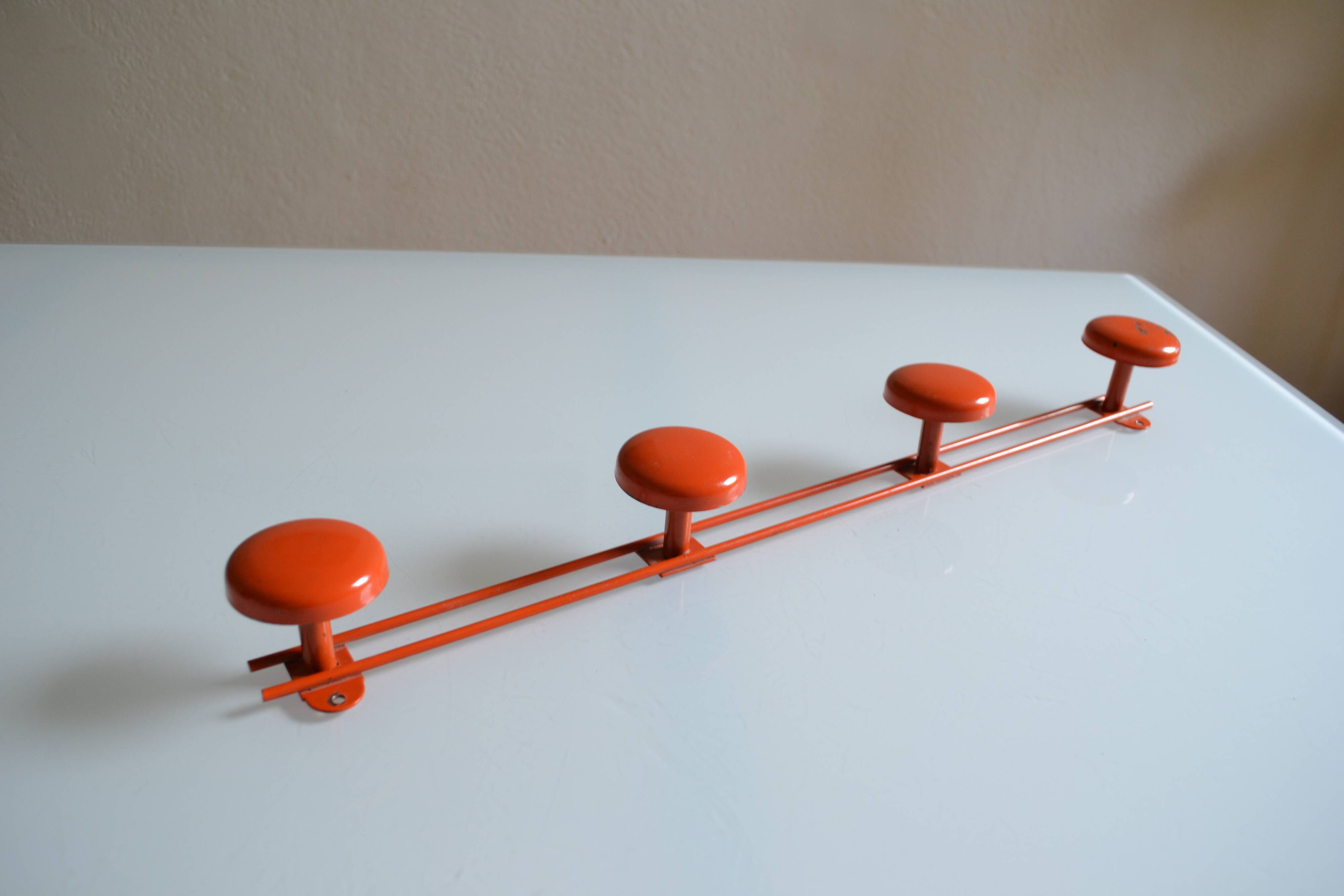 Vintage 70s orange lacquered metal 4-hook wall coat rack