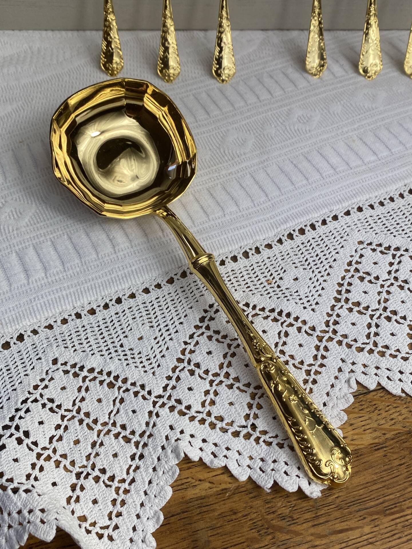 Dessert spoons and serving ladle