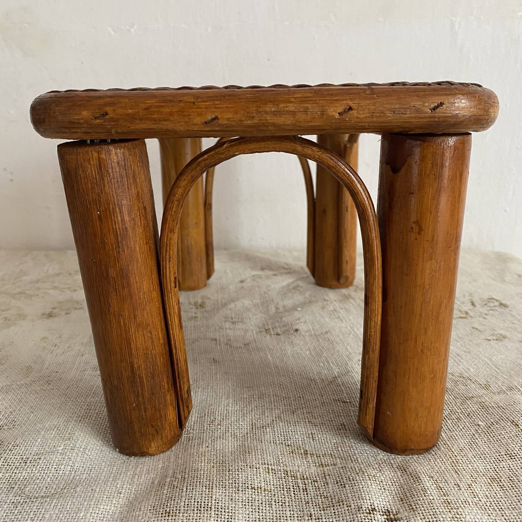 Vintage low rattan stool