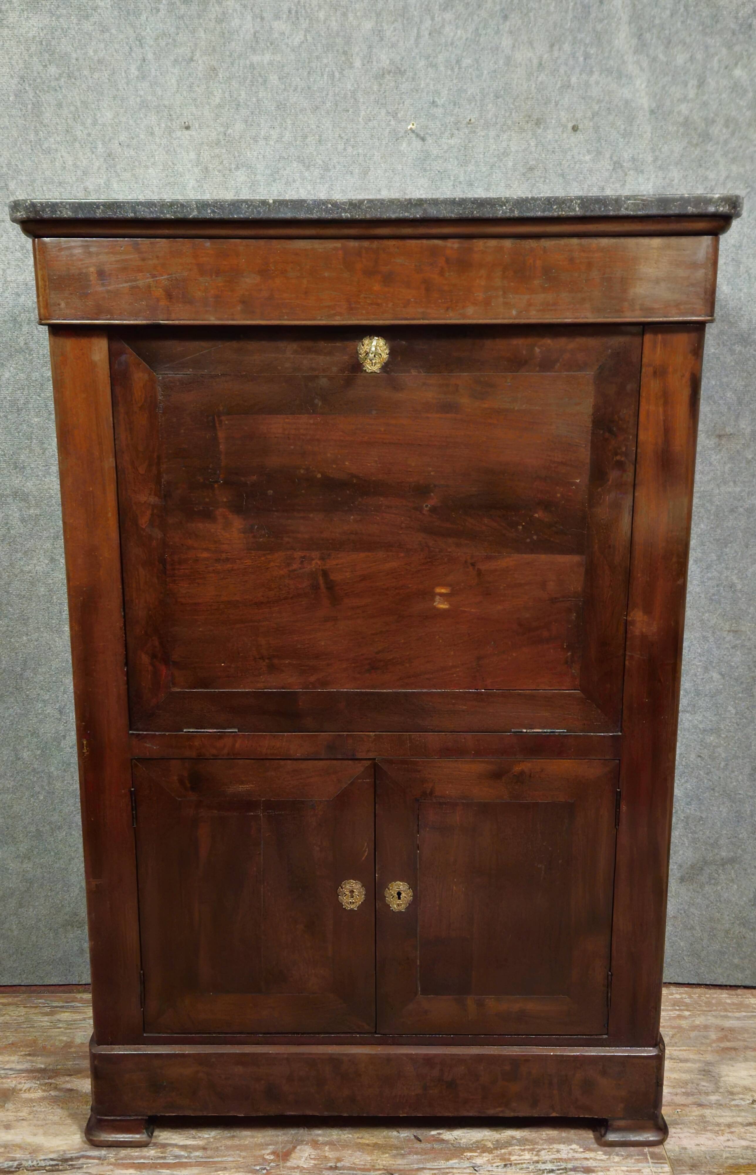 Secretary from the Restoration / Louis Philippe period, 19th century, in mahogany.