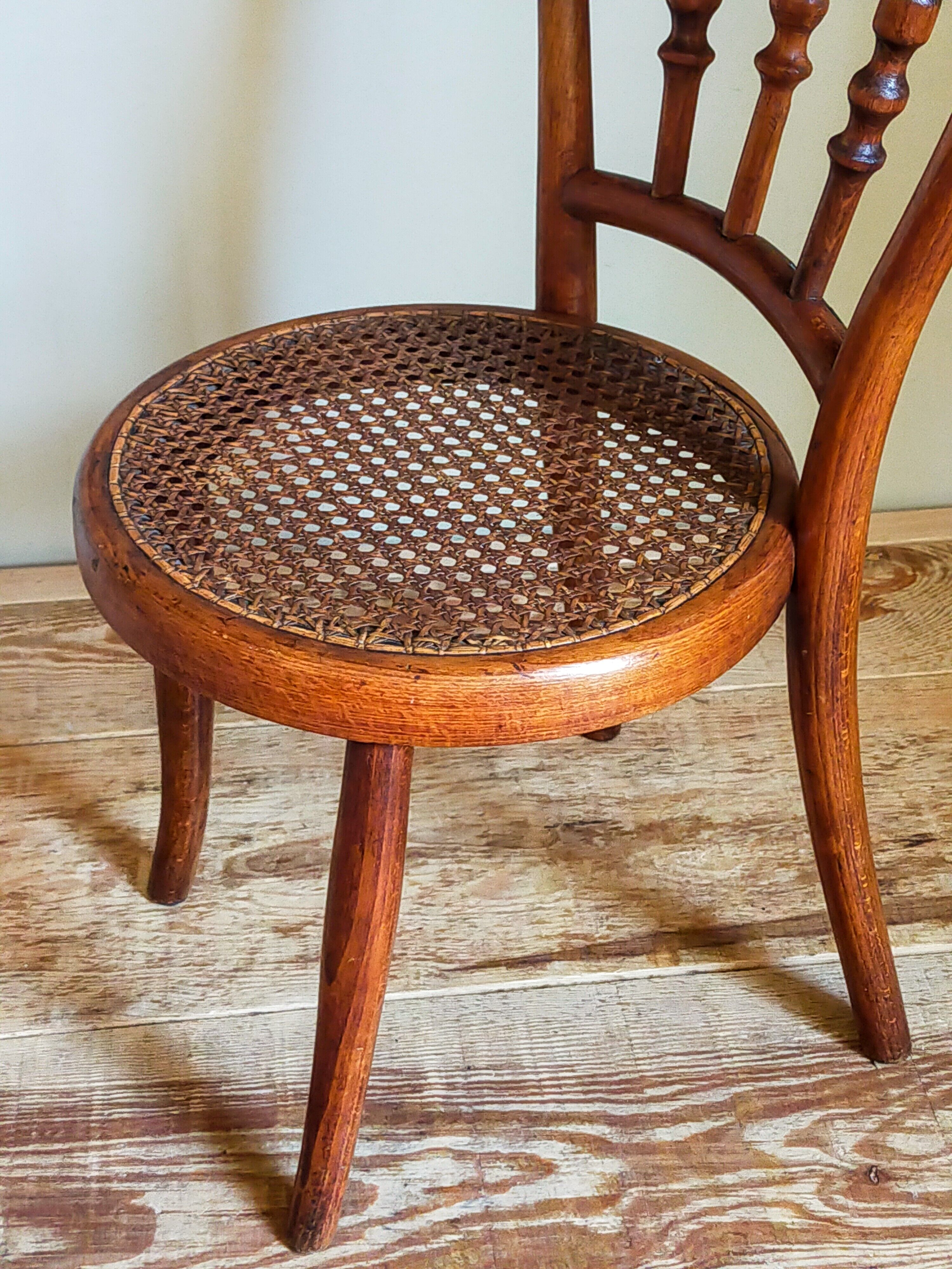 Children's chair in curved round wood old year