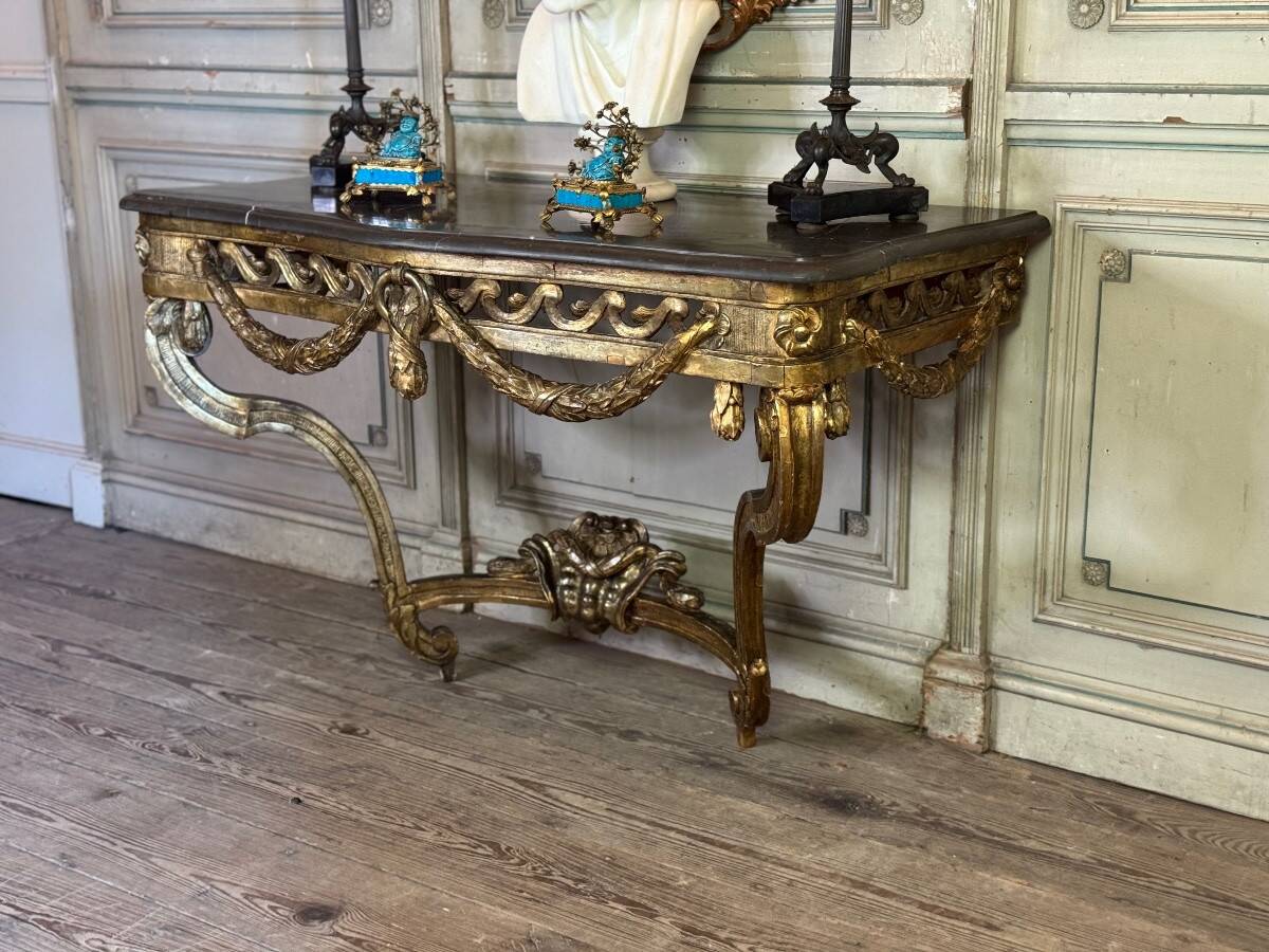 Transitional console in carved and gilded wood, France, 18th century