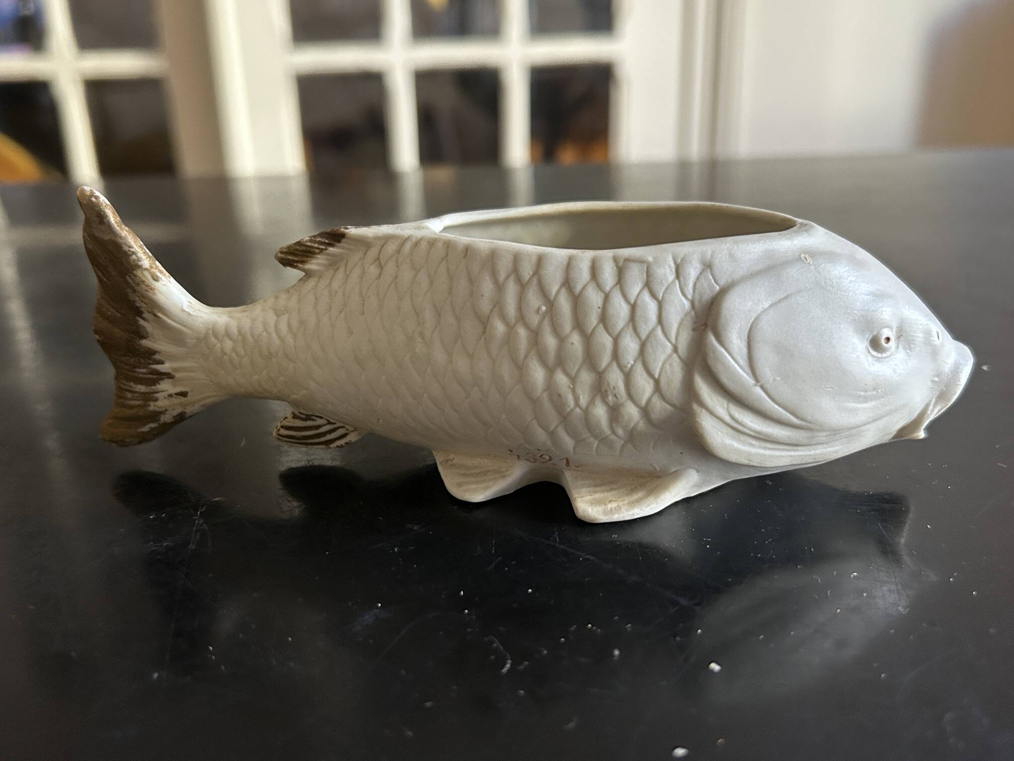 fish pocket ashtray in biscuit Heubach & co