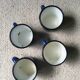 Batch of 4 enamelled sheet metal mugs