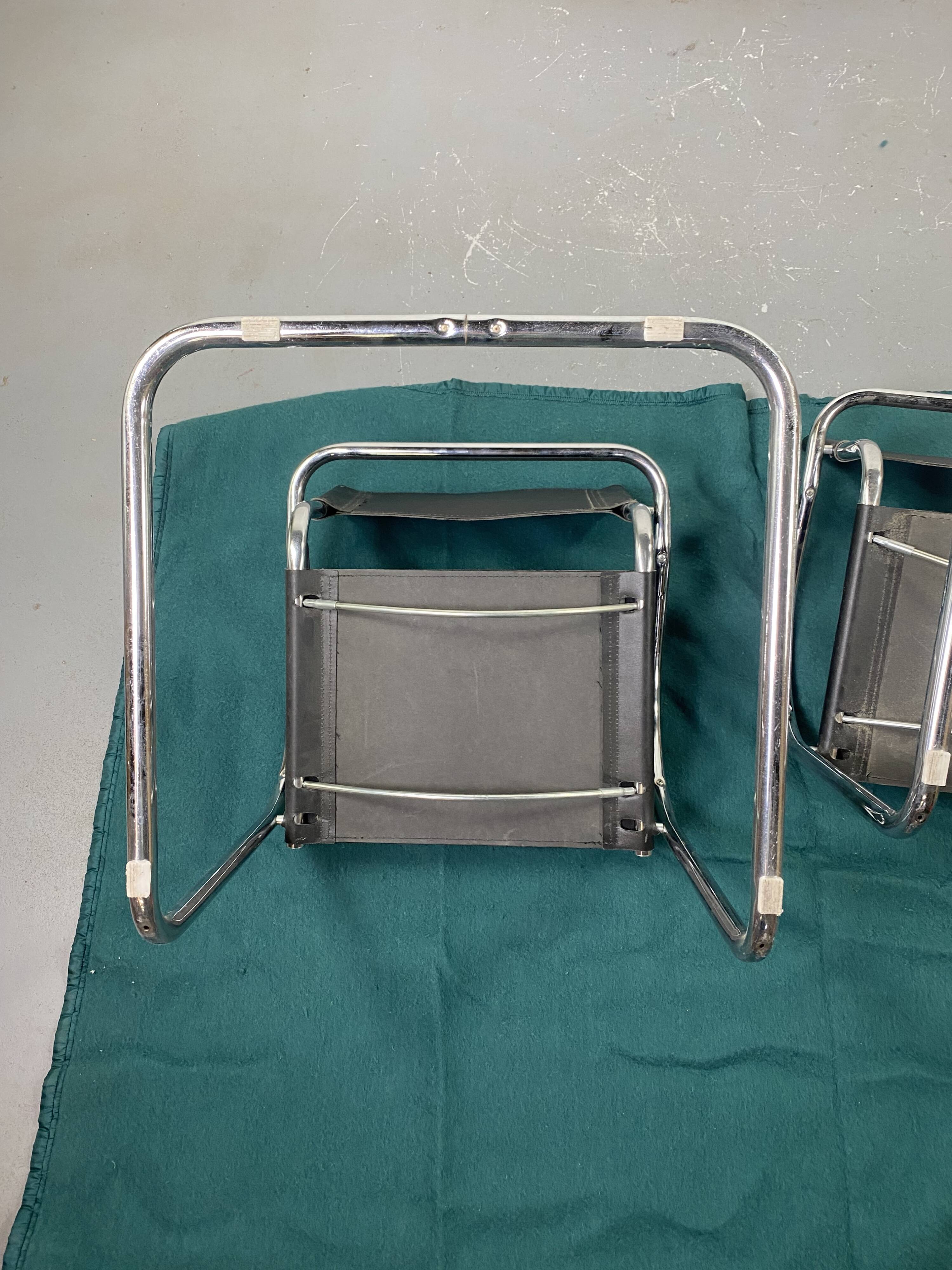 Pair of design armchairs in imitation leather chrome