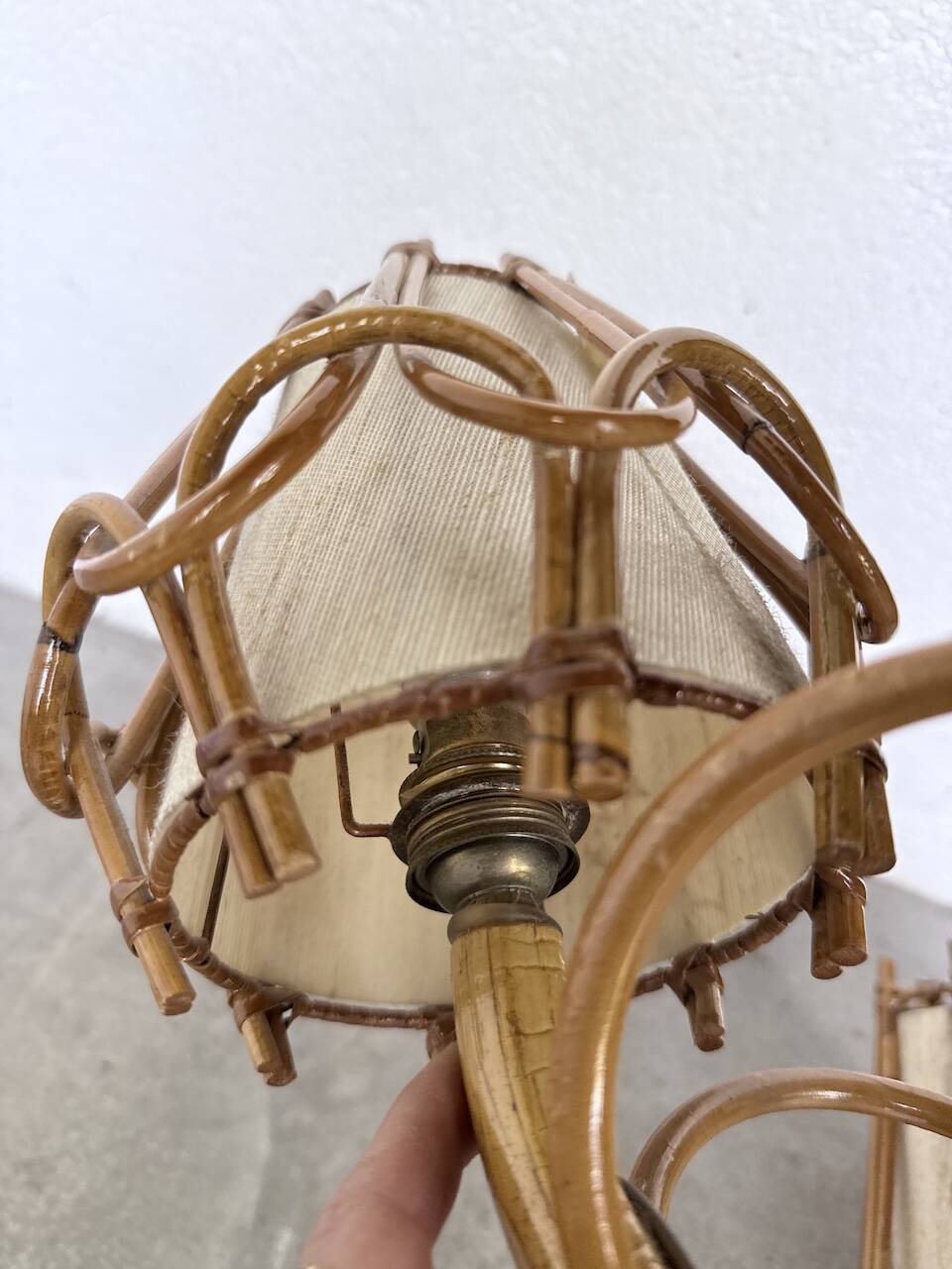 Pair of rattan wall lights by Louis Sognot, 1960.