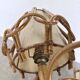 Pair of rattan wall lights by Louis Sognot, 1960.