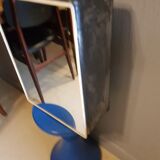 Vintage wax metal medicine cabinet.