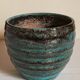Ceramic planter with speckled enamel gadroons from the 1940s