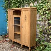 Asymmetrical Art Deco glass-fronted Parisian wardrobe in raw oak, 1930.