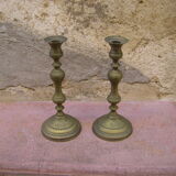Pair of candle holders with oriental decoration