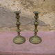 Pair of candle holders with oriental decoration