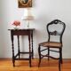 Antique solid oak side table with turned wooden legs.