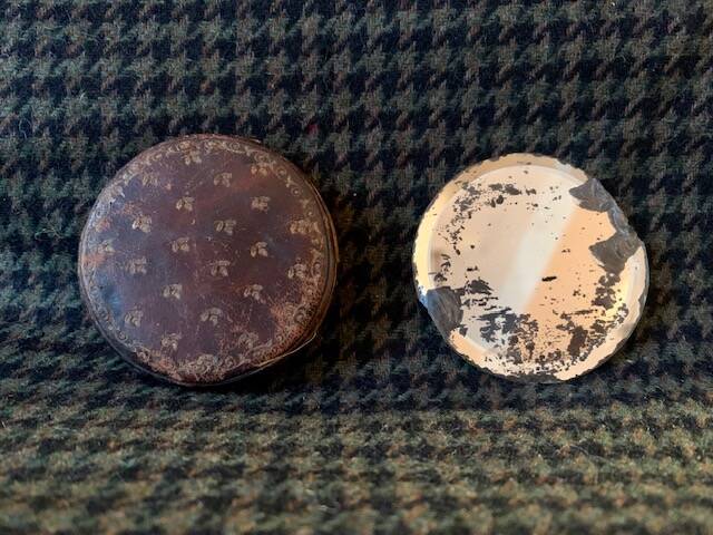 Very old round pocket mirror and leather case, 18th century