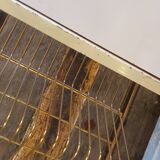 White coffee table and vintage gold metal