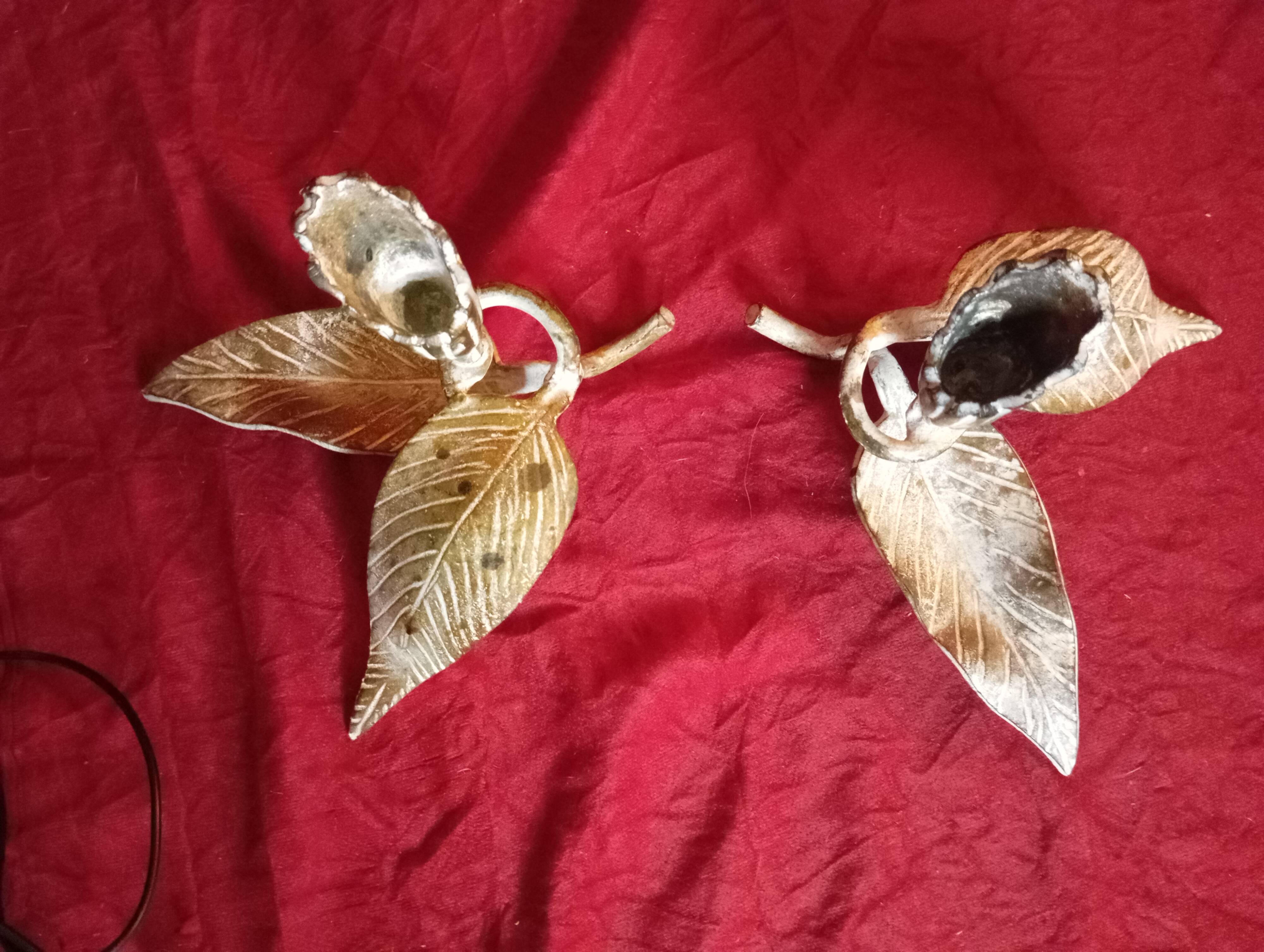 Pair of patina metal candle holders