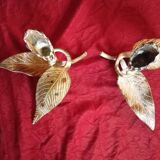 Pair of patina metal candle holders