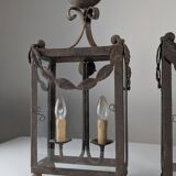Wrought iron lantern with glass panels, leaf motifs