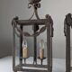 Wrought iron lantern with glass panels, leaf motifs