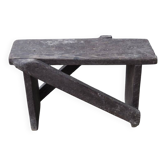 Low stool in vintage brown painted pine from the 1940s, with a rectangular seat.
