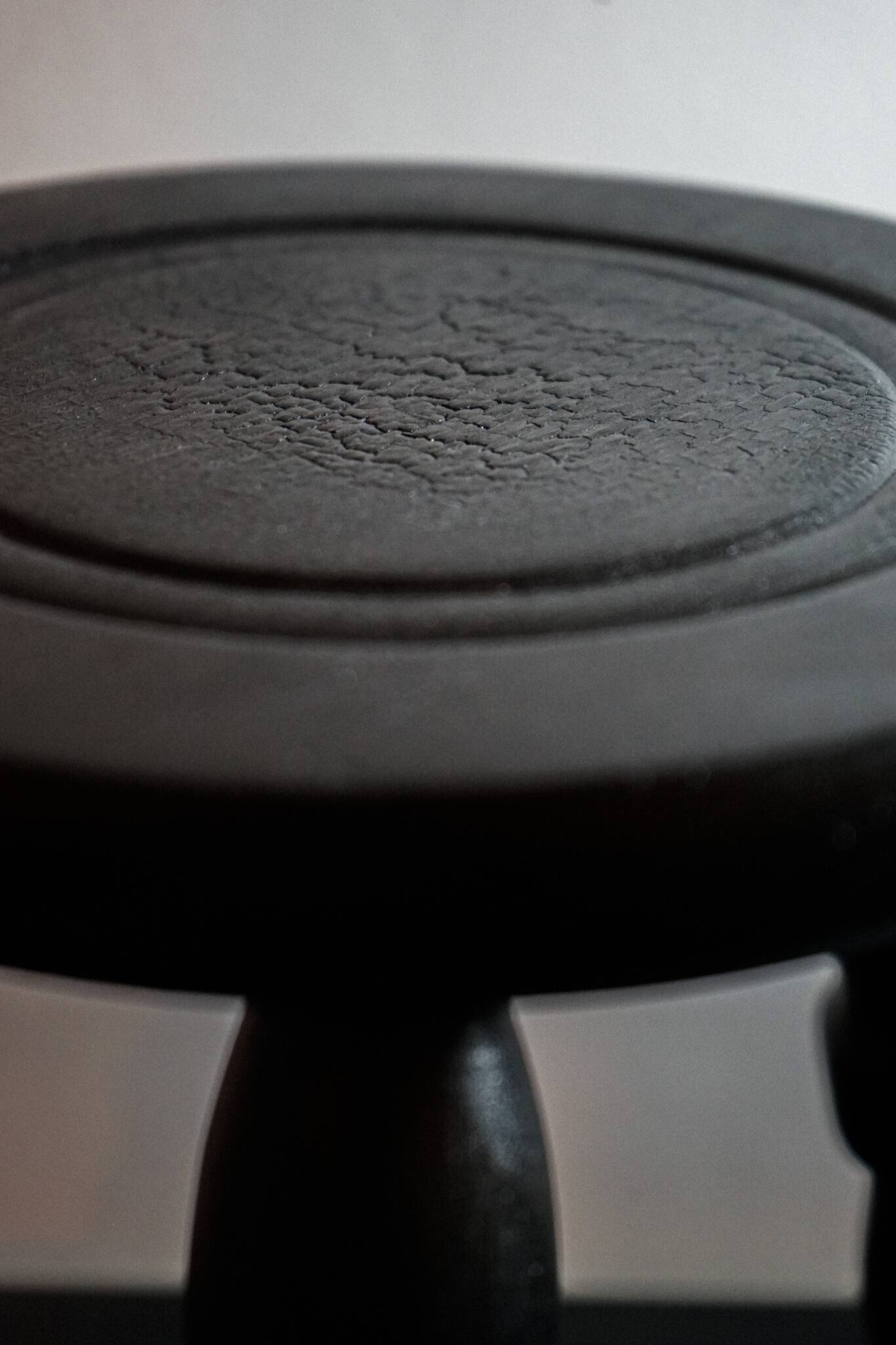 The small tripod in burnt oak wood