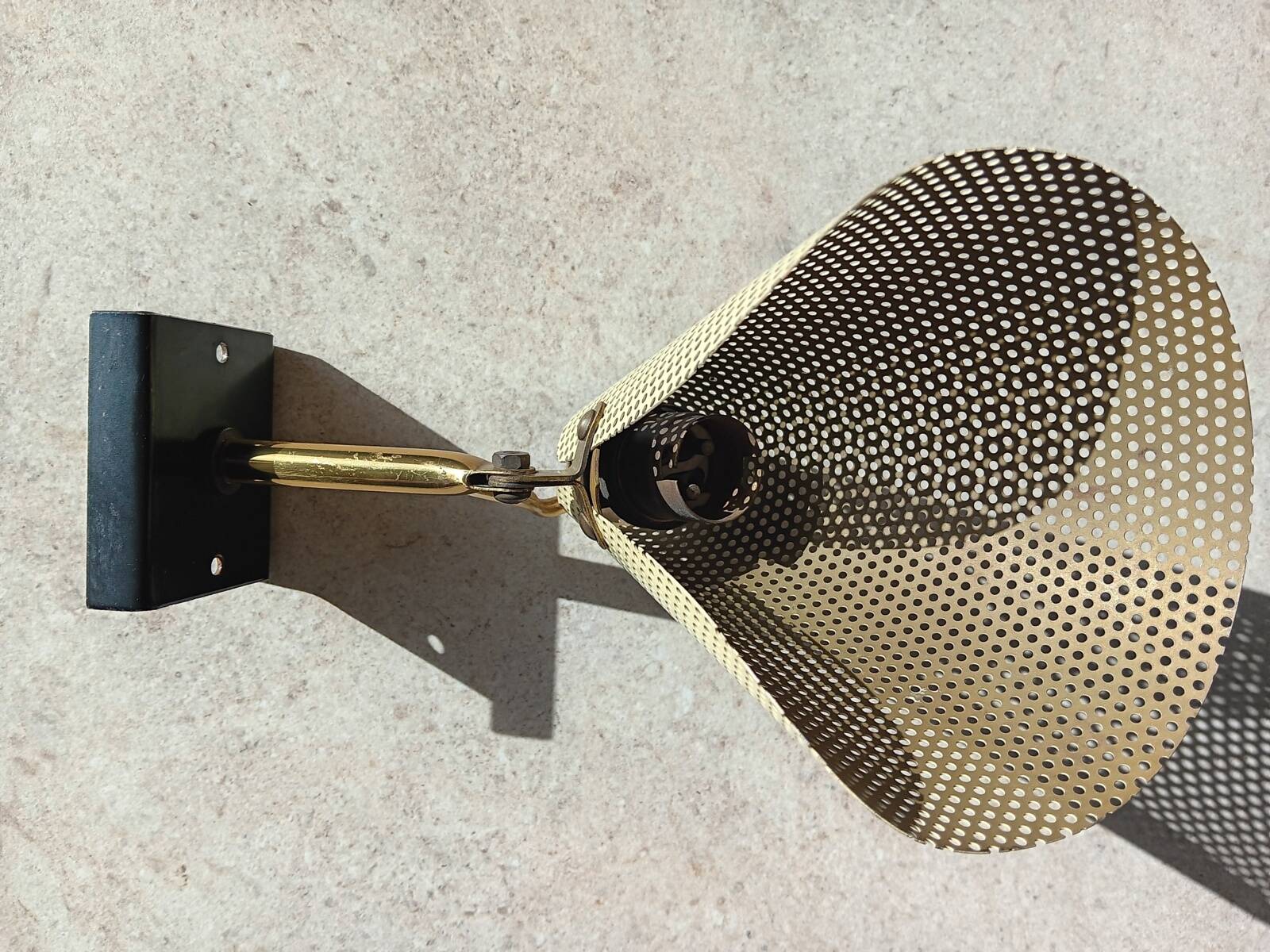 Pair of perforated metal horn wall lights
