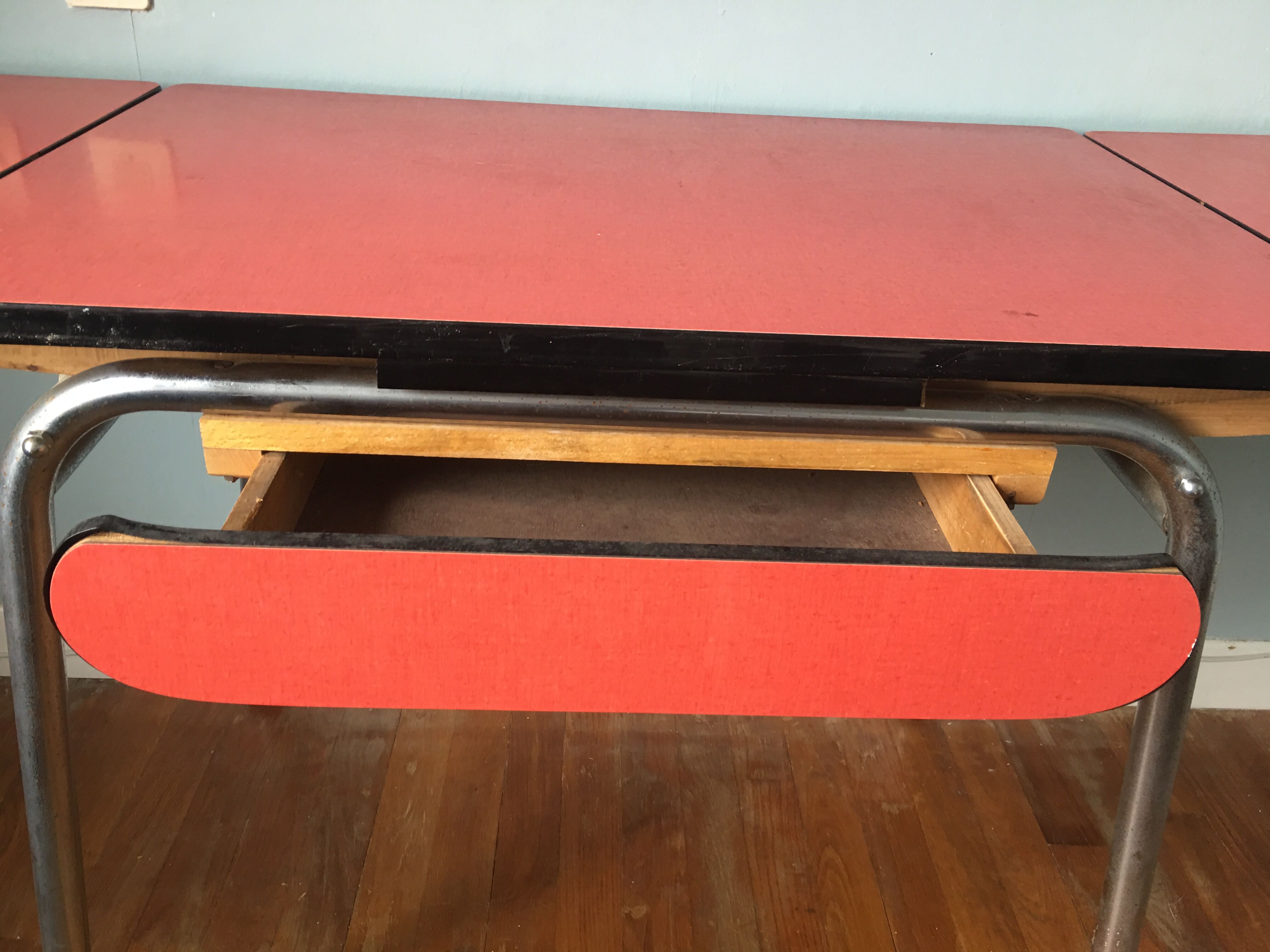 Large table in red formica with extensions + red drawer