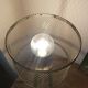 Industrial lamp in black metal to pose.