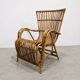 Vintage armchair from the 70s in natural rattan.