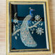 Embroidered peacock frame