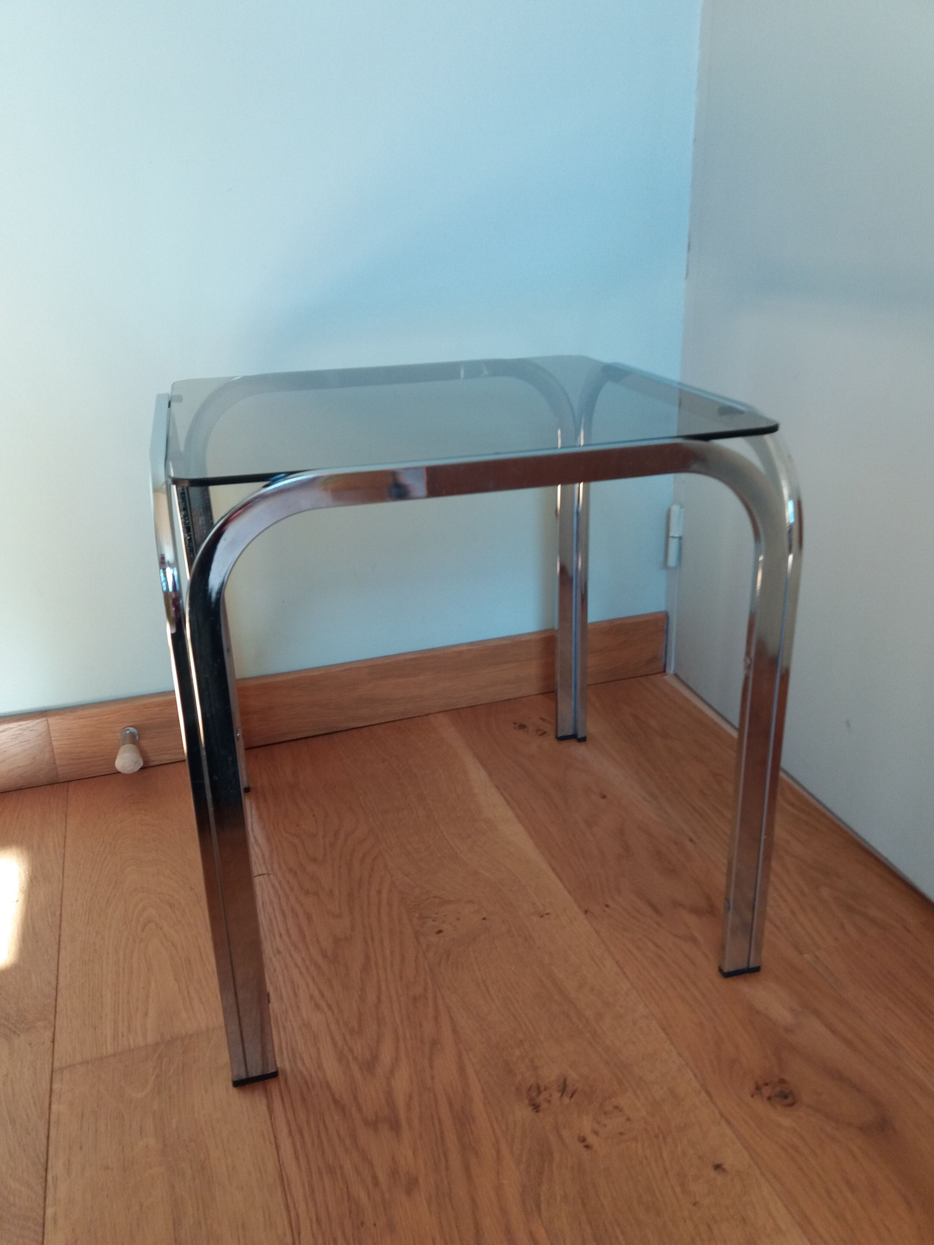 Square coffee table in chromed metal and smoked glass