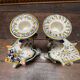 Griffon candlesticks in Old Rouen earthenware