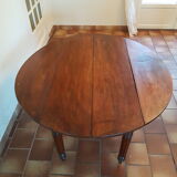 Table ronde à volets ancienne