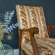 Floral-patterned velvet armchair