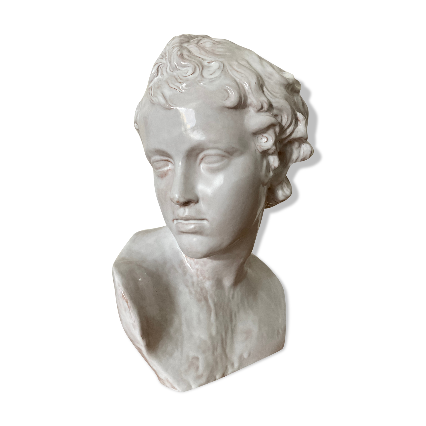 White enamelled terracotta Eros bust