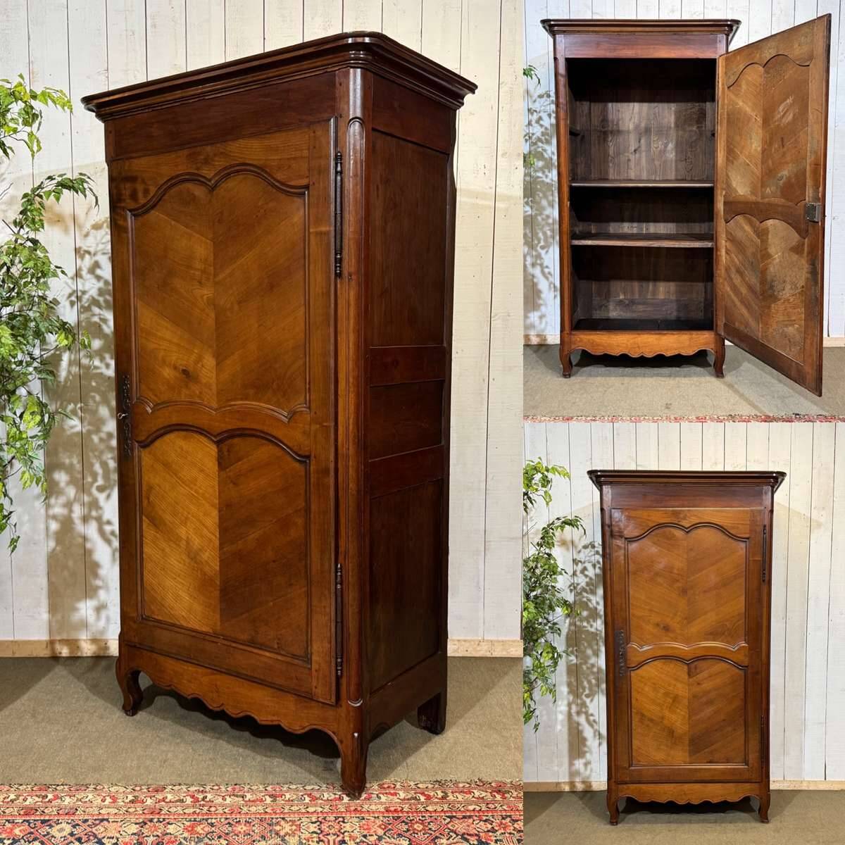 Louis XV bonnetière in cherry wood, early 19th century.