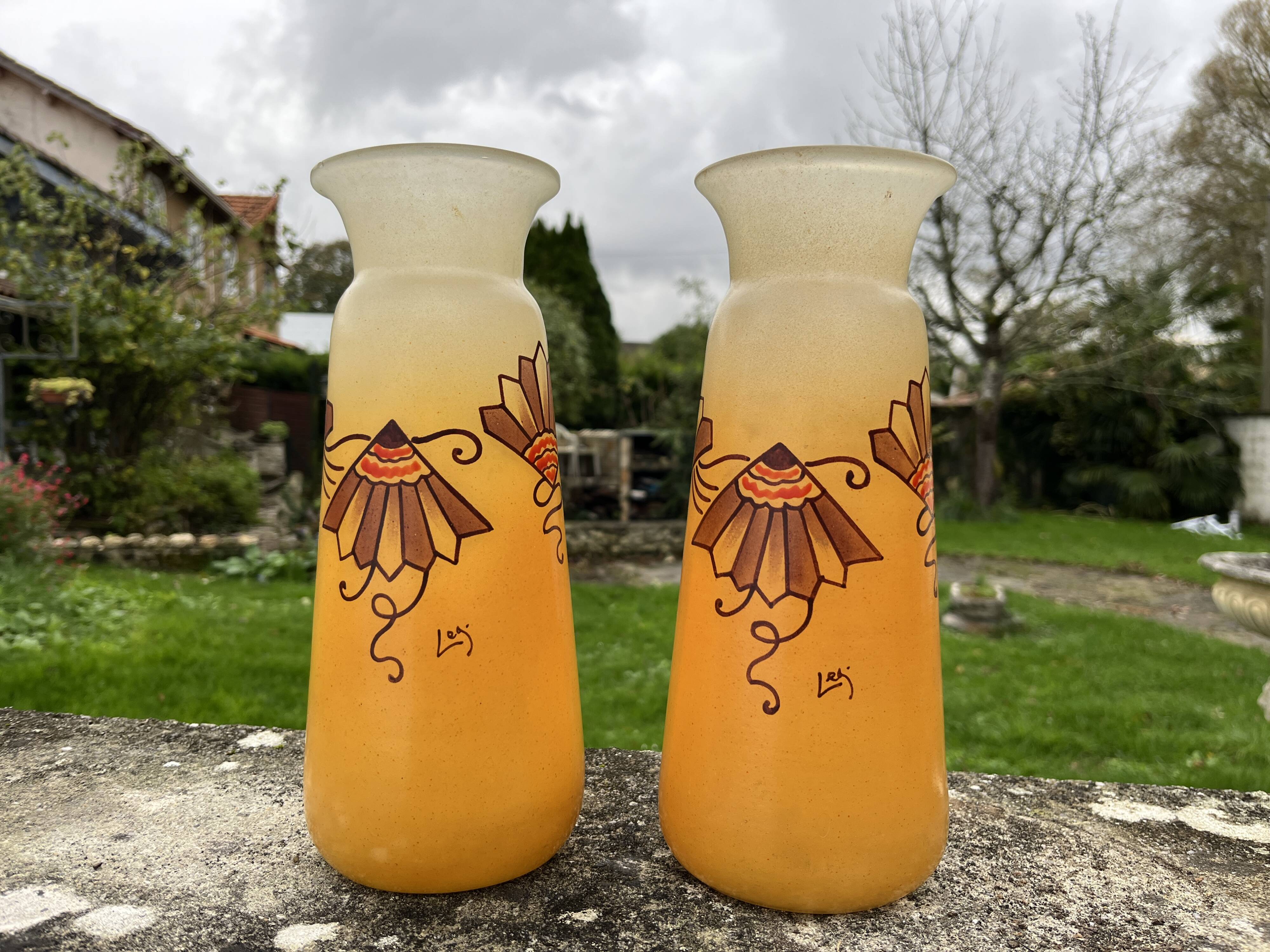 Pair of orange Legras Art Deco enameled glass vases