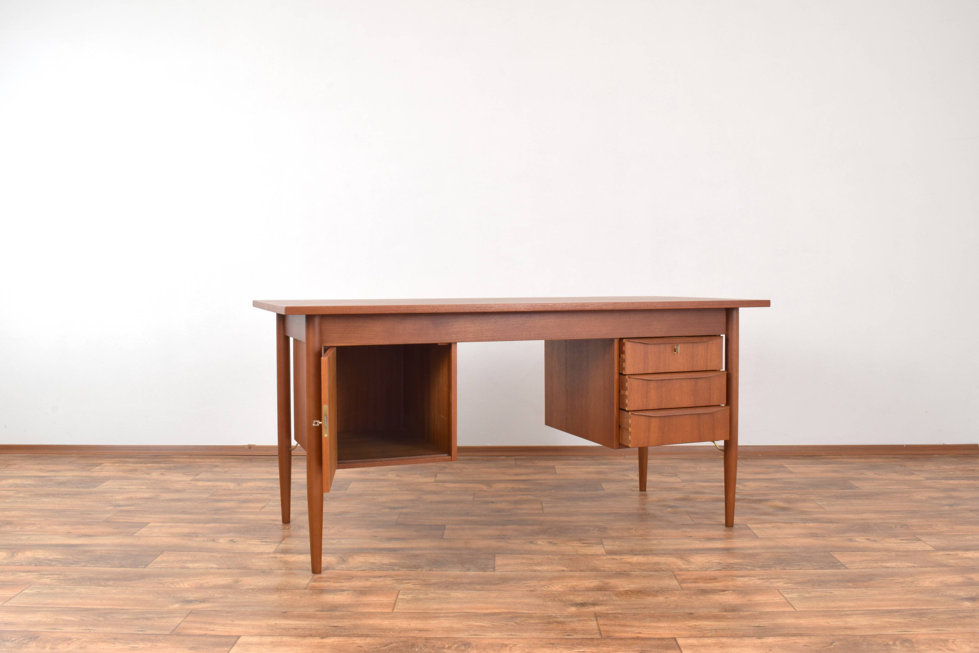 Mid-Century Danish Teak Desk by Gunnar Nielsen for Tibergaard, 1960s.