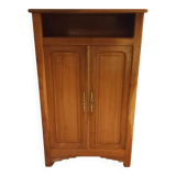 Small table and cherry wood sideboard.