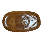 Carved wooden platter in Black Forest style.