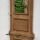 Coat rack with mirror and brass