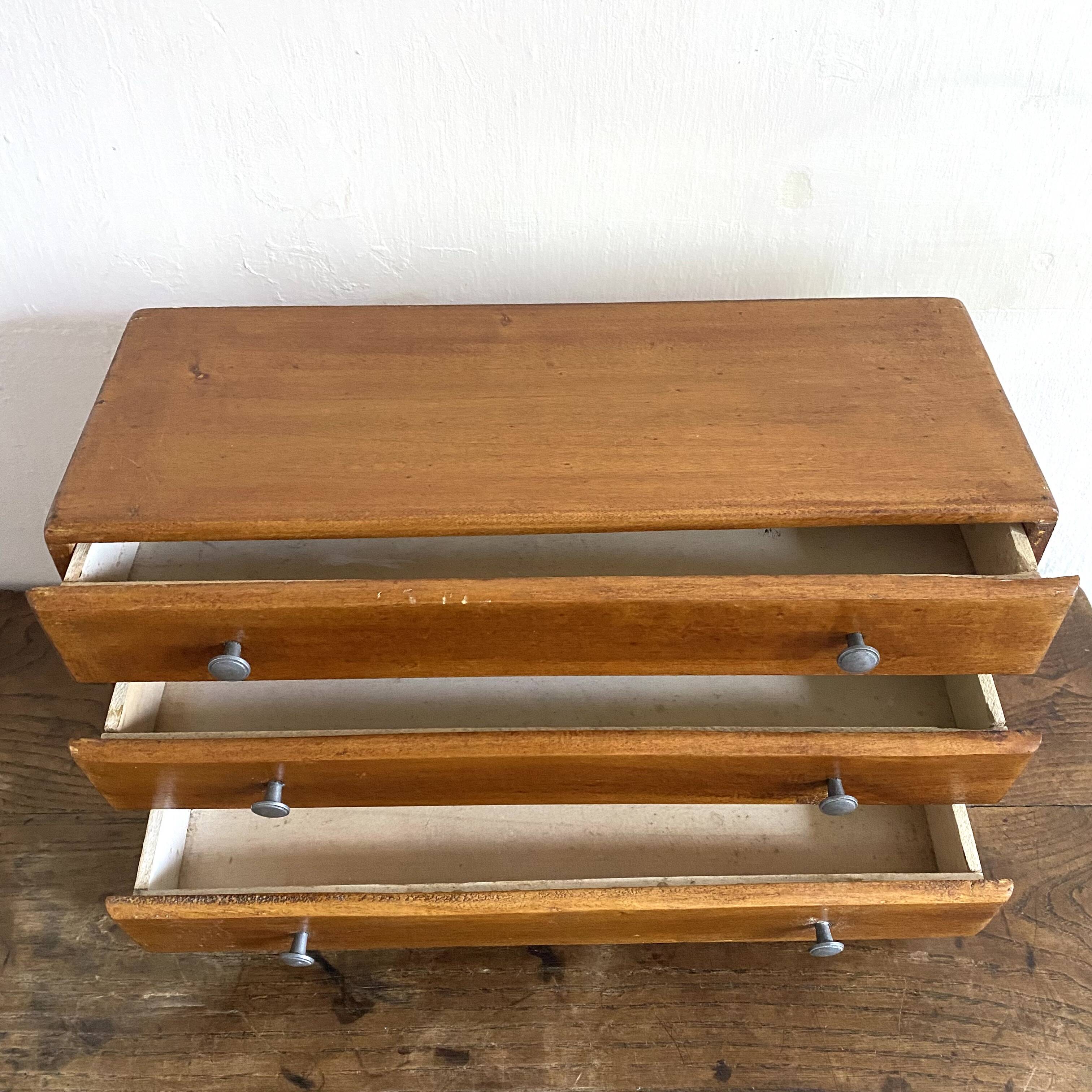 Small piece of furniture with drawers from the 50s and 60s