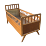 Child bed in wooden foot compass