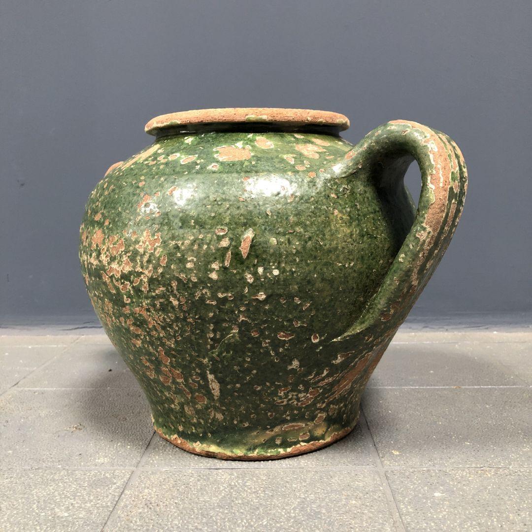 Dark green jug enamelled