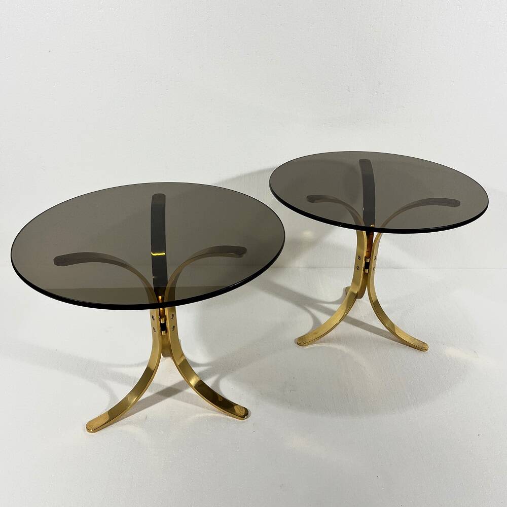 Brass and smoked glass side tables from the 1960s.