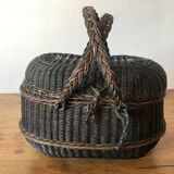 Old black picnic basket, lined inside